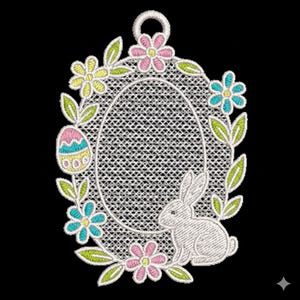 May include: Embroidered Easter egg-shaped design featuring a white bunny, flowers, and an Easter egg. The design has pink, blue, yellow, and green accents. The design is surrounded by a floral and leaf border, ideal for Easter decorations.