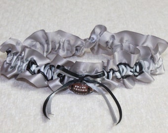 Oakland Raiders football garter