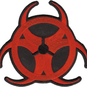 May include: Red and black biohazard symbol patch. The symbol is a stylised three-leaf clover with a black centre.