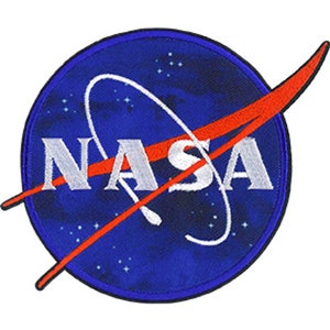 May include: A blue and red embroidered NASA patch with a white stylised letter logo and a red curved line.