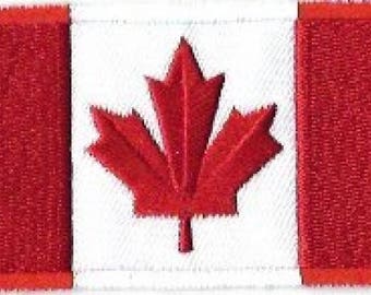 May include: A rectangular patch featuring the Canadian flag. The flag has a white center with a red maple leaf, flanked by two red vertical bars. The maple leaf is a stylized, five-pointed design.