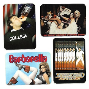 May include: Four vintage movie poster stickers. The stickers feature images from the films "The Rocky Horror Picture Show", "Barbarella", "Saturday Night Fever", and "Animal House".