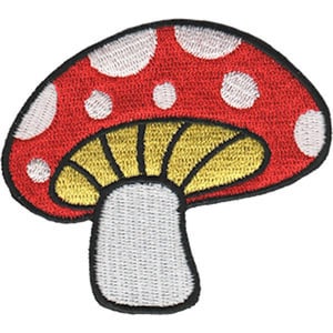 May include: Red and white mushroom patch with a yellow underside and a white stem.