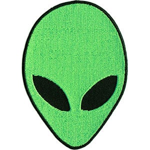May include: Green alien face with black eyes. The alien face is a simple, cartoon-style design.