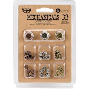 May include: A package of 33 mini metal embellishment knobs in various colors and designs. The package includes a variety of shapes and finishes, including bronze, silver, and gold tones. The package is labeled "MECHANICALS MINI KNOBS".