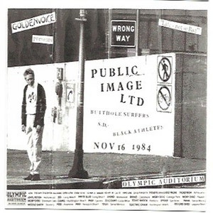 May include: Black and white photo of a concert poster for Public Image Ltd. with supporting acts Butthole Surfers, S.D., and Black Athletes. The concert is scheduled for November 16, 1984 at the Olympic Auditorium.