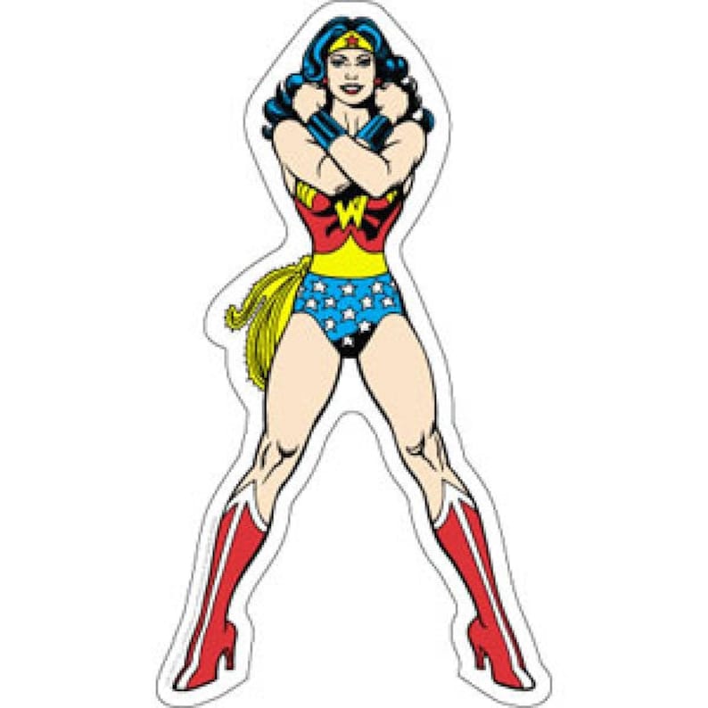 May include: A full-body illustration of Wonder Woman in her classic costume. She is wearing a red and gold top, blue shorts with white stars, red boots, and a gold tiara. Her arms are crossed, and she has a yellow lasso.