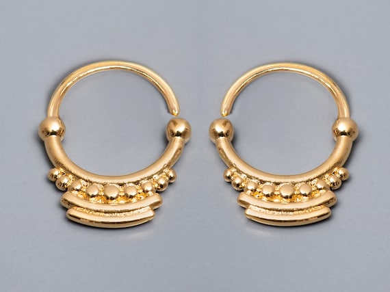 Gold tribal hoop best sale earrings