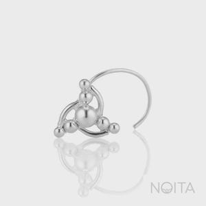 May include: A silver nose ring with a cluster of small, round beads in a triangular arrangement. The design is attached to a curved post for nostril insertion. The jewellery is shown on a reflective surface.