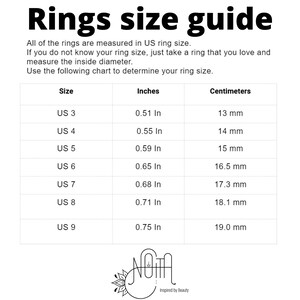May include: A chart showing US ring sizes in inches and millimeters. The chart includes sizes 3 through 9.