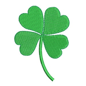 May include: A green four-leaf clover with a stem. The clover is a traditional symbol of good luck.