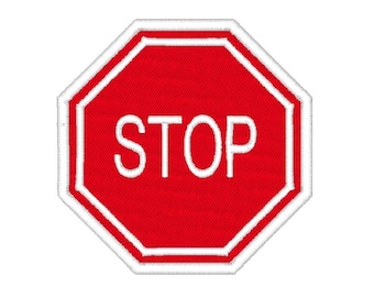 Könnte beinhalten: Ein rotes achteckiges Stoppschild mit weißem Rand und weißem Text, der "STOP" lautet.