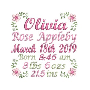 May include: A white embroidered design with the name "Olivia Rose Appleby", birth date, time, weight (8 lbs 6 oz), and height (21.5 inches). The text is in pink and green, with floral accents.