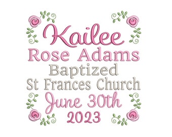 May include: A pink and gray embroidered design with the text "Kailee Rose Adams Baptized St. Frances Church June 30th 2023". The design is surrounded by floral embellishments.