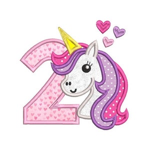 May include: Pink and purple unicorn with a yellow horn and a pink number 2 with white hearts. The unicorn has a white face with black eyes and a pink and purple mane. There are three pink hearts above the unicorn.