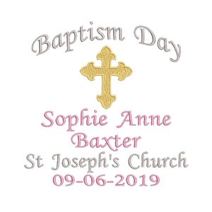 May include: A white background with a gold cross and the text "Baptism Day" in silver, "Sophie Anne Baxter" in pink, "St Joseph's Church" in silver, and "09-06-2019" in pink.