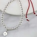 Personalised Silver Bead and Cotton Thread Friendship Bracelet with Round Solid Silver Stamped Initial Charm