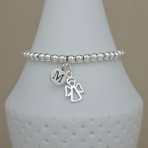Pulsera personalizada con dije de ángel recortado en plata de ley