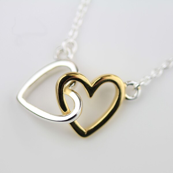 Interlocking Pair Of Solid Silver and Gold Hearts Necklace