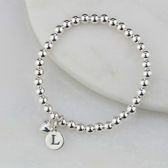 tiffany bracelet on Mercari | Tiffany bracelets, Heart charm bracelet,  Charm bracelet