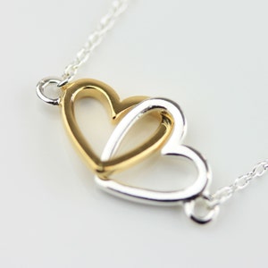 Interlocking Pair Of Solid Silver and Gold Hearts Necklace image 2