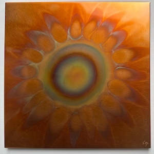 May include: A square metal wall art piece featuring a polished copper finish with a central circular design. The surface displays a radial pattern of petal-like shapes in shades of orange, bronze, and iridescent blue, with a signature in the corner.