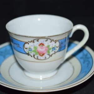 Chugai tea cup and saucer / blue /  white / small tea cup / gold trim / floral design / Chugai China / Occupied Japan / Cup 2.5&quot; / saucer 5&quot;