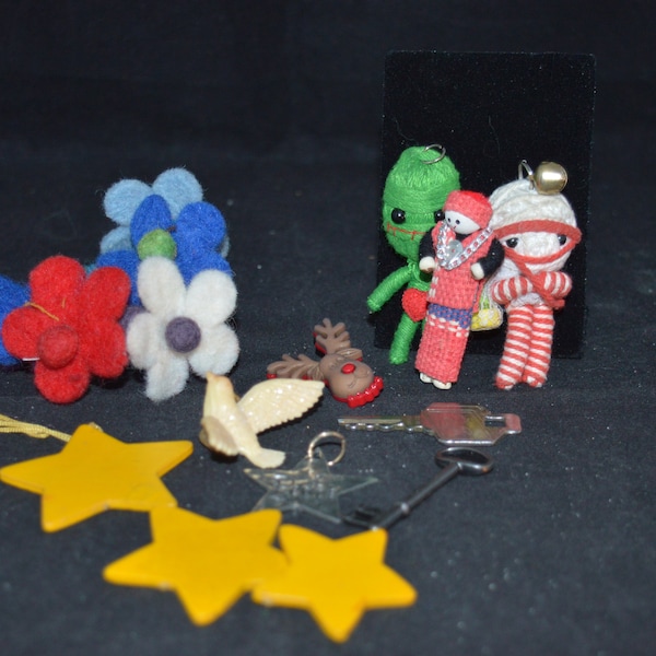 Assorted craft odds and ends / felt flowers / string dolls / wood stars / keys / reindeer / peace star / dove / Good condition