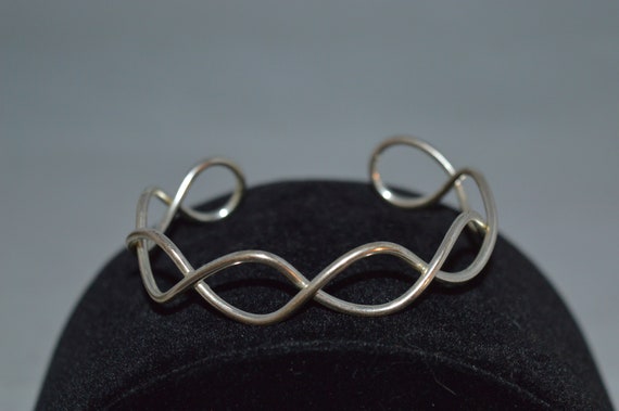 Bangle bracelet / silvertone / loop / 2.5" x 2" /… - image 1