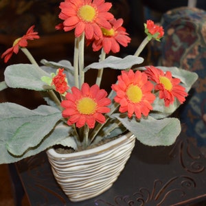 Orange silk flowers / striped planter / planter / 5&quot; x 5&quot; /  12&quot; high overall / orange / silk / flowers / floral arrangement / silk flowers