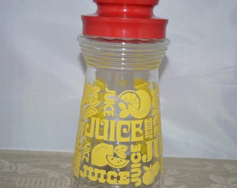 Juice bottle / carafe / glass / word Juice / yellow / red screw top / glass carafe / glass juice carafe / juice carafe / juice server