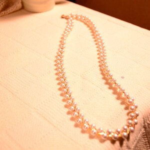 Pearl Necklace / two strands / entwined gold chain / 24" long / made in Korea / Korea / vintage costume /vintage necklace / vintage pearls