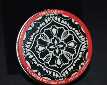 Tiny tin /  black / red / white / design /  2" diameter x .75" / Good condition / round / tin / small tin / pill box / mints / Vera Bradley