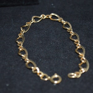 Oval link bracelet / gold tone / costume jewelry / 7 inches long / gold bracelet / gold tone bracelet / gold jewelry / bracelet / link