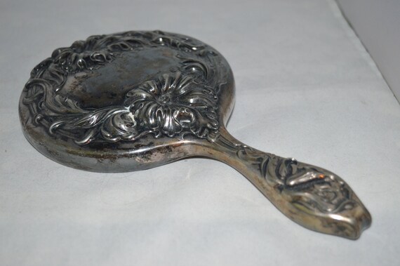 Silver plated hand mirror / floral design / silver