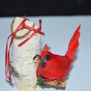 Cardinal bird on a branch ornament. 3&quot; x 2.5&quot;  Good condition