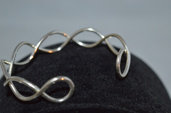 Bangle bracelet / silvertone / loop / 2.5" x 2" /… - image 3