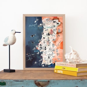 May include: A watercolor map of Portugal with hand-drawn illustrations of landmarks and cities. The map is divided into two sections, one for Portugal and one for Spain. The map is framed in a light wood frame.