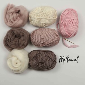 May include: Six balls of yarn in various shades of pink, brown, and white. The yarn is arranged in a square pattern. The word "Millennial" is written in black cursive on the white background.