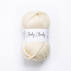 May include: A ball of off-white yarn labeled "Cheeky Chunky" with a heart logo.