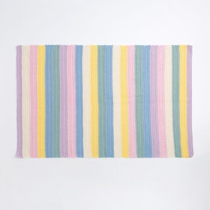 May include: A rectangular crochet blanket featuring a repeating vertical striped pattern in pastel colors including light purple, soft pink, bright yellow, sky blue, mint green, and cream white. The texture shows consistent yarn stitches.