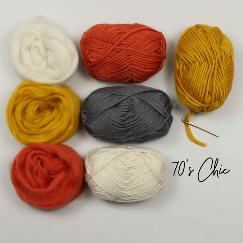 May include: Six balls of yarn in various colors, including white, orange, yellow, and gray, with a small knitting needle. The text "70's Chic" is written in black on a white background.