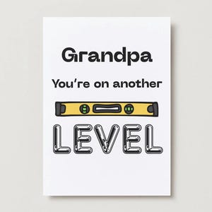 May include: A white greeting card with the words "Grandpa, You're on another LEVEL" in black text. A yellow and black level tool graphic is centered between the phrases. The card is a simple, clean design.