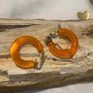 Lucite Clear Orange Hoop CLIP ON OHRRINGE gestempelt Hong Kong