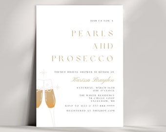 Puede incluir: Una tarjeta de invitación blanca con texto dorado anunciando una despedida de soltera con el tema "Perlas y Prosecco" para Karissa Brayden. La invitación incluye la fecha, la hora, la ubicación y la información de RSVP.