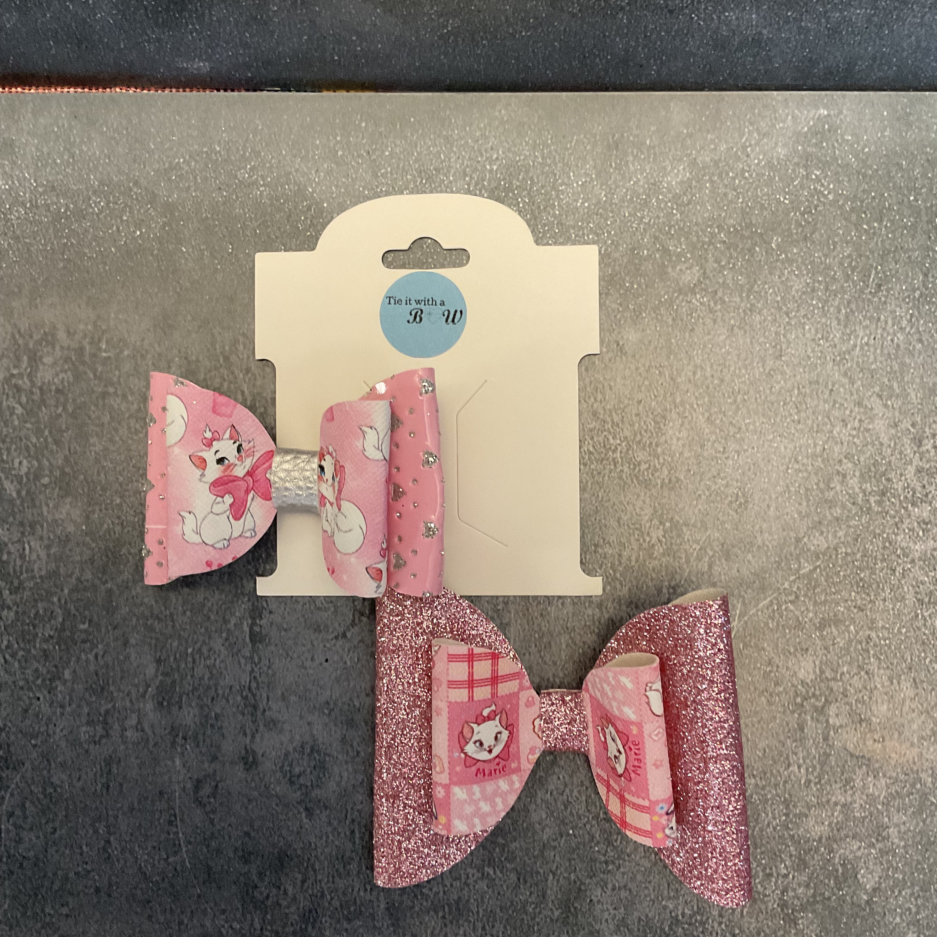 Marie pink Arisrocats themed glitter faux leather girls hair bow