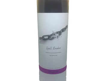 May include: A black glass candle with a white label that says "Spell Breaker" and "The Psychic Line". The label also has a graphic of a broken chain. The bottom of the candle has a purple label that says "All Natural Products" and "Spiritual Candles".