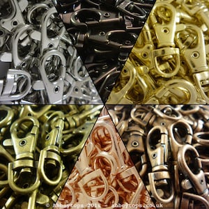 May include: A close-up view of a variety of metal swivel clasps in different finishes, including silver, gold, black, and copper.