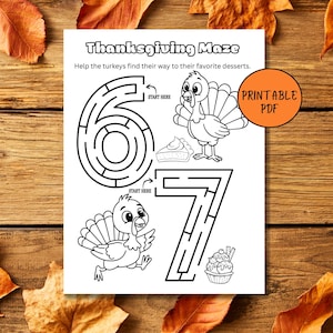 May include: A black and white Thanksgiving-themed printable PDF featuring mazes shaped like the numbers six and seven. The mazes have illustrations of turkeys and desserts. The text reads "Thanksgiving Maze" and "Printable PDF".
