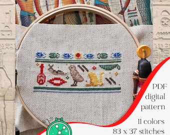 Patrón de punto de cruz "Trasero bonito en jeroglíficos": diseño inspirado en la mitología del antiguo Egipto.